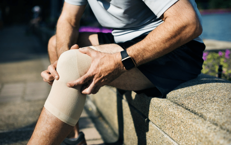 nategnjene kolenske vezi simptomi